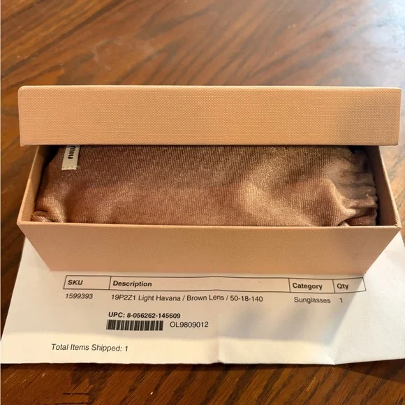 Miu Miu Tortoiseshell Oval Sunglasses with Brown Lenses - Picture 4 of 6